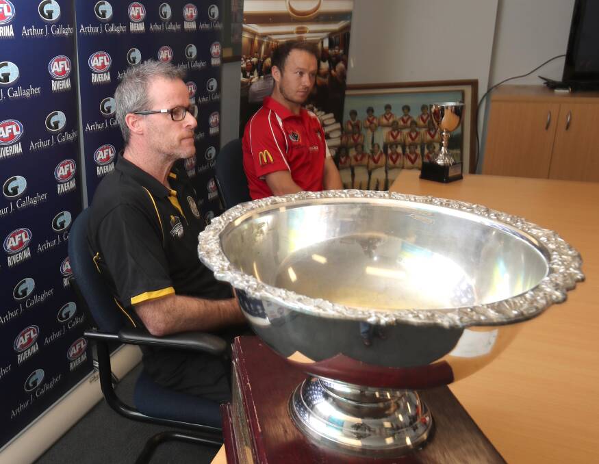 Tigers coach Troy Maiden with Griffith's Will Griggs at Thursday's pre-grand final media conference.