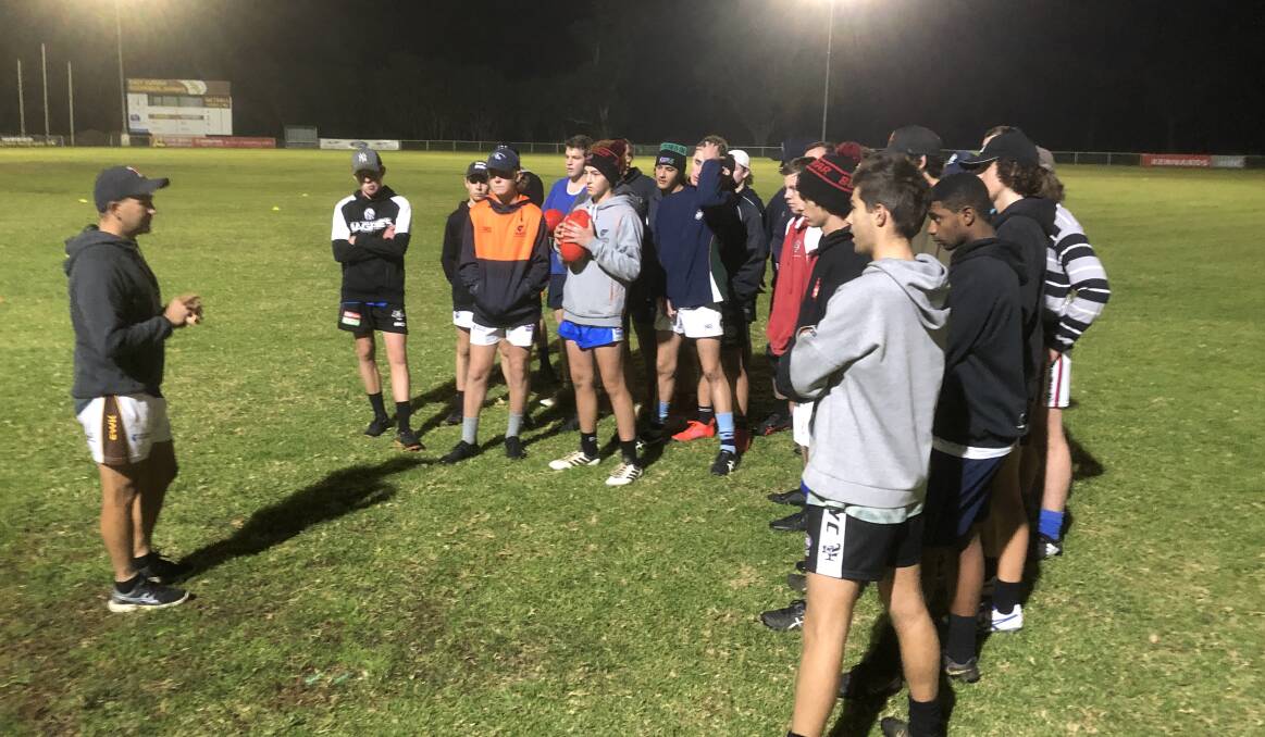 FINAL PREP: Farrer League Under 17s coach Craig De Piazza addresses his players at Thursday night's training session. Picture: Peter Doherty