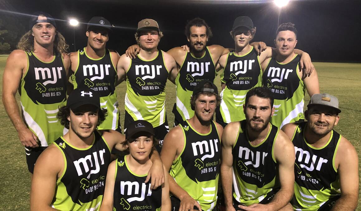BACK-TO-BACK: MJR Electrics celebrate their stunning last-second win over The Casuals in Wagga Touch's Men's Premier League decider. 