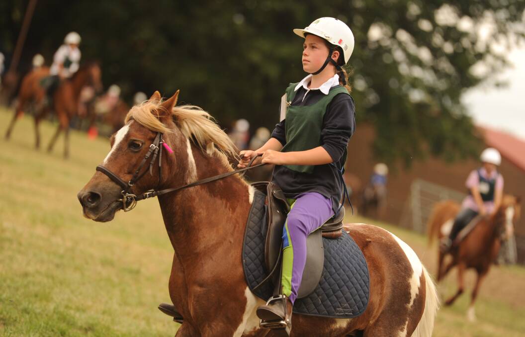 LIFETIME IN THE SADDLE: Emily Waters captured by the DA at a Tumbarumba Pony Camp event back in 2011.