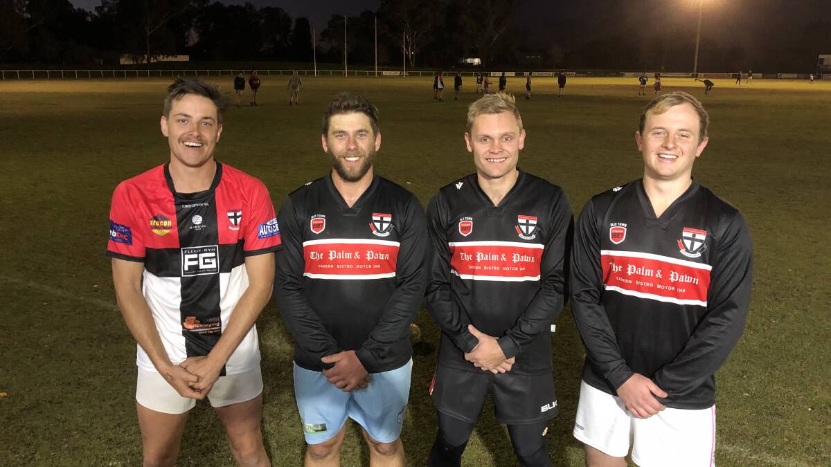 SAINTS' SOUL: North Wagga backmen (from left) Ben Alexander, Matt Thomas,
Brayden Skeers and Sam Longmore are among the club's longest-serving players.
On Saturday, they share the job of shutting down the Hawks. Picture: Peter Doherty