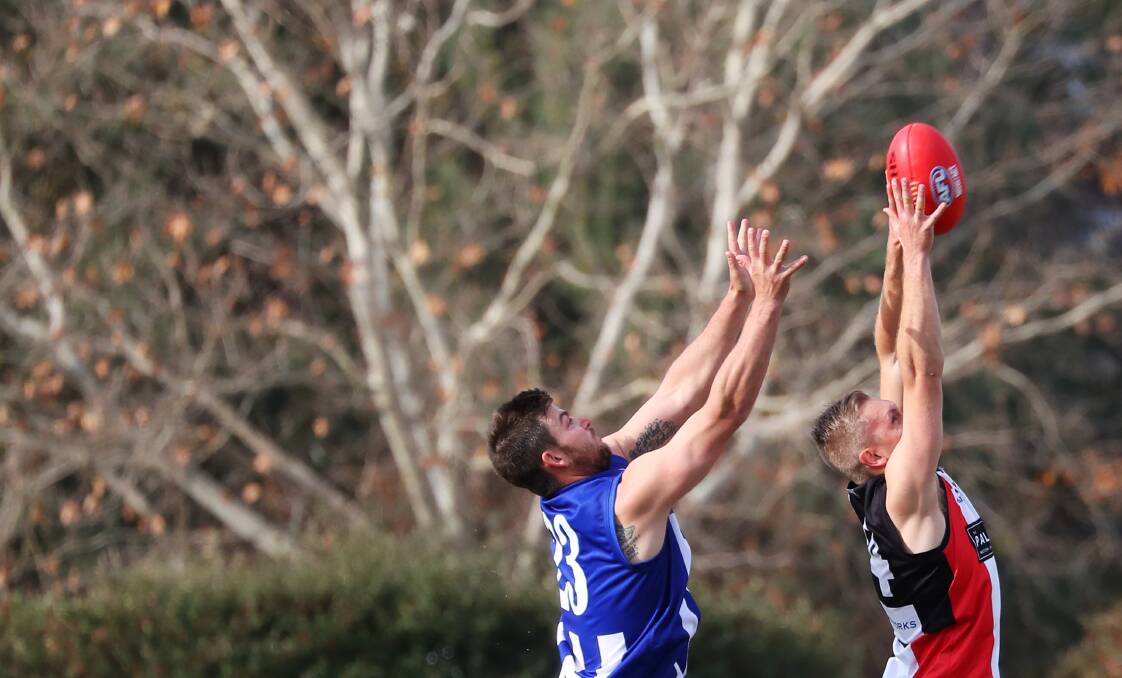 TALL TIMBER: Saints full-back Brayden Skeers gets in front of Temora forward Matt Harpley on this occasion. Picture: Emma Hillier
