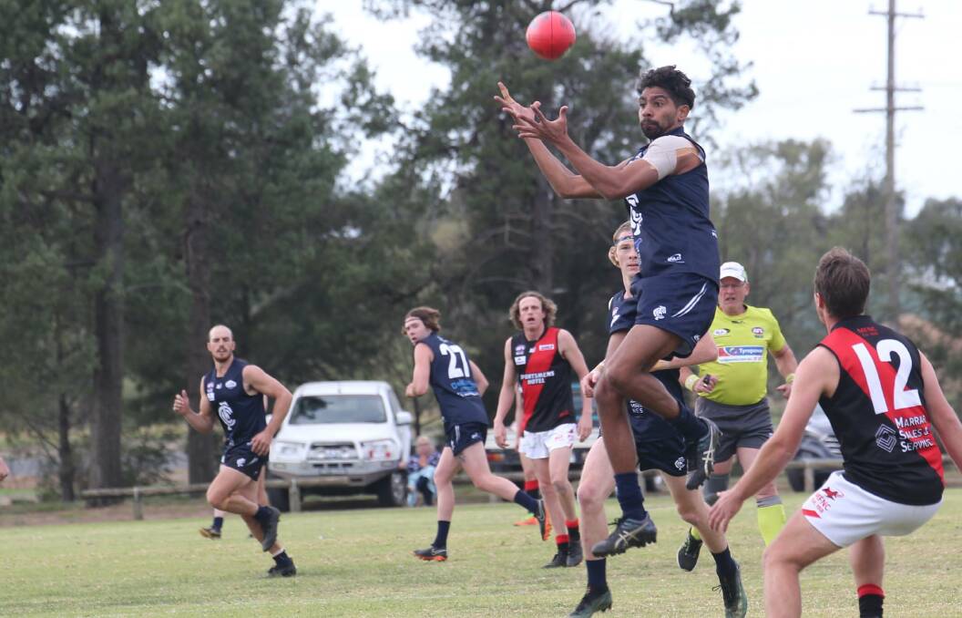 BIG CALL: Coleambally's Charlie McAdam against Marrar last year. The Blues were due to play the Bombers in the first round on July 18 this year, but withdrew from the competition on Wednesday night. 