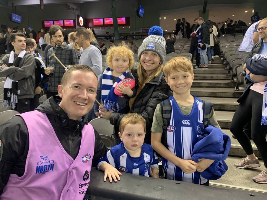 FAMILY TIME: Matt Turnbull with wife Caroline and children Liliana, 2, Will, 4, and John, 8, after one of his final North Melbourne games last month. 