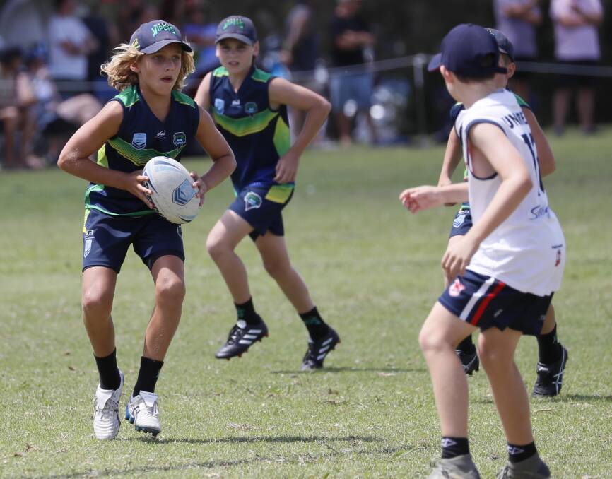 SIZING UP THE OPPOSITION: Wagga Vipers' Harry Rynehart weighs up his options in their Under 14s game against Easts on Saturday. Pictures: Les Smith