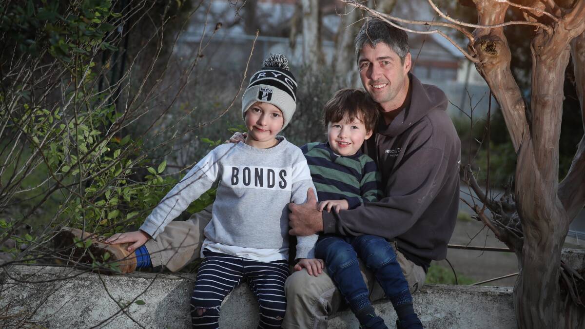 The Rock-Yerong Creek's Justin Driscoll relaxes at home with sons Jock, 5, and Alfie, 3, ahead of a big day for the club on Saturday. Picture: Les Smith