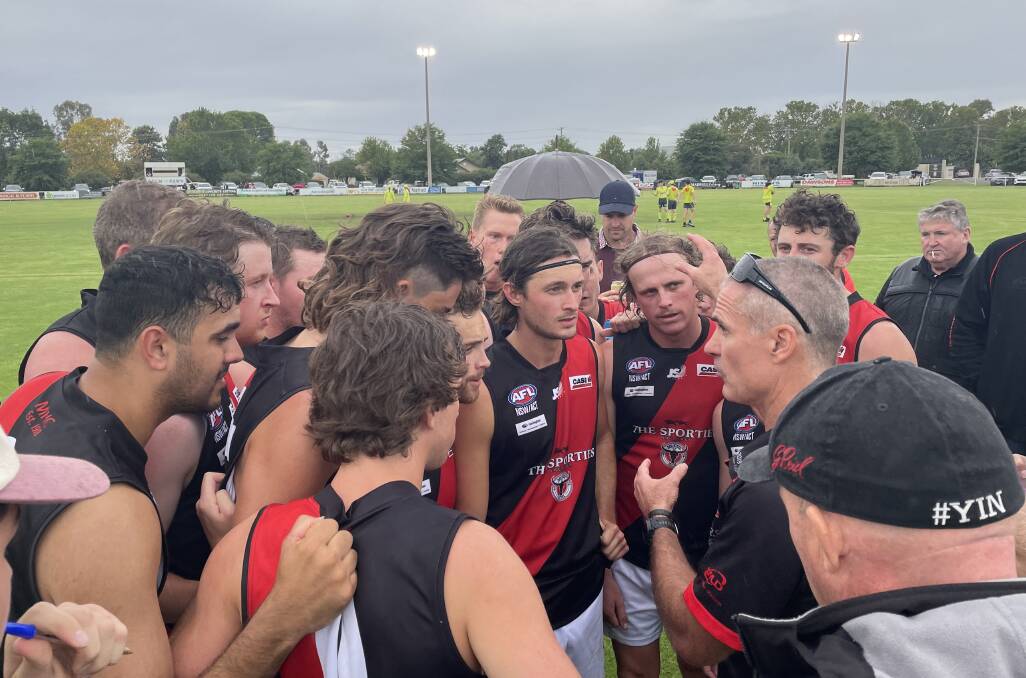COMEBACK KINGS: Marrar listen up at three quarter time, having already dug themselves out of a 41 point hole just before half time at Nort h Wagga. Picture: Peter Doherty