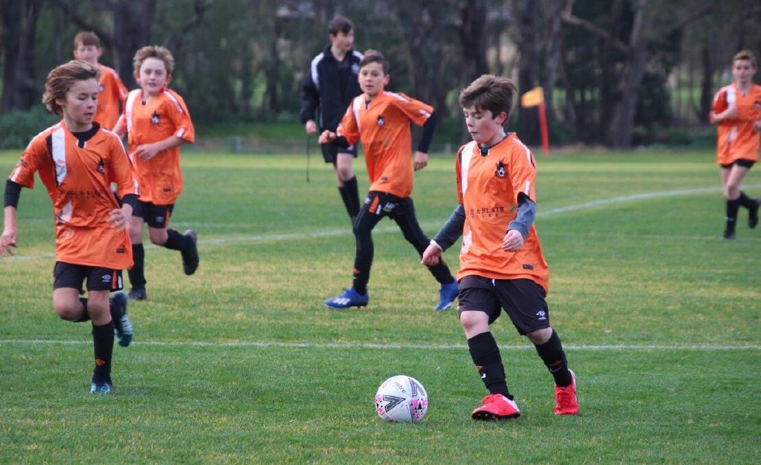 ON THE MOVE: James Hyde controls the ball for Wagga United Swifts. Still eligible for under 11s, the team is making waves in Football Wagga's under 12s comp. 