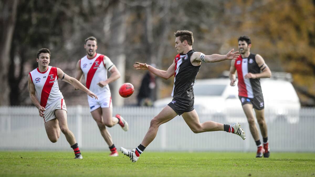 Guy Richardson playing for Ainslie in 2018. He'll join his brothers at Temora for the shortened Farrer League season.