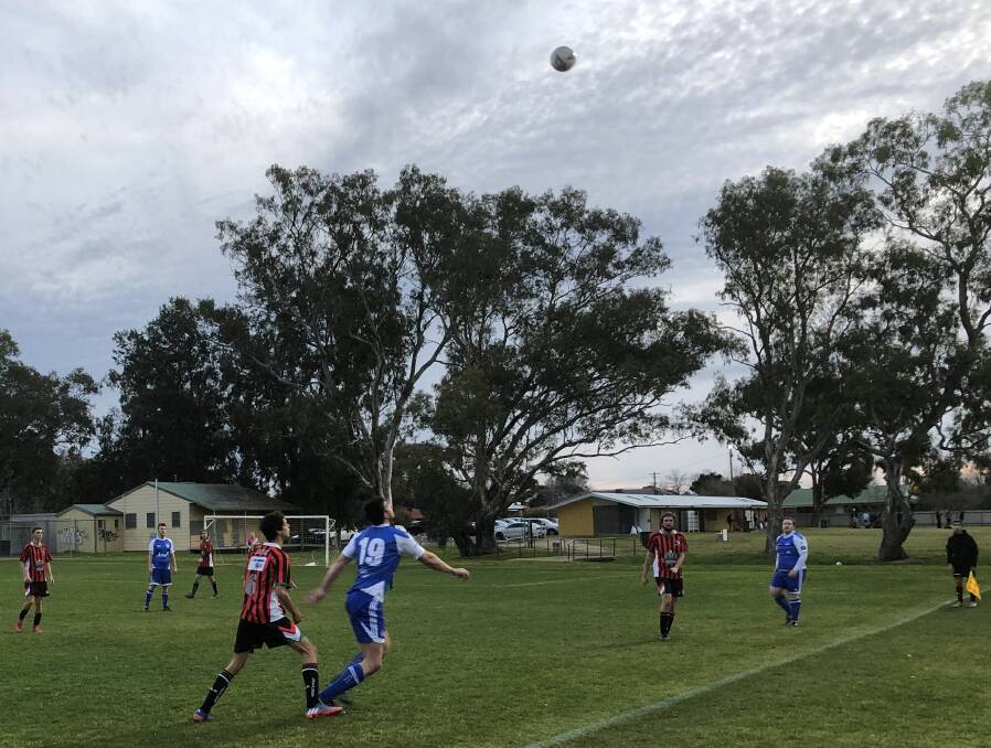 DIFFERENT GAME: Nick Hull playing for Tolland Wolves' thirds in Football Waga's Blake Trophy competition. Even before coronavirus, Hull had decided on a break from Australian Rules and took up soccer for a change.