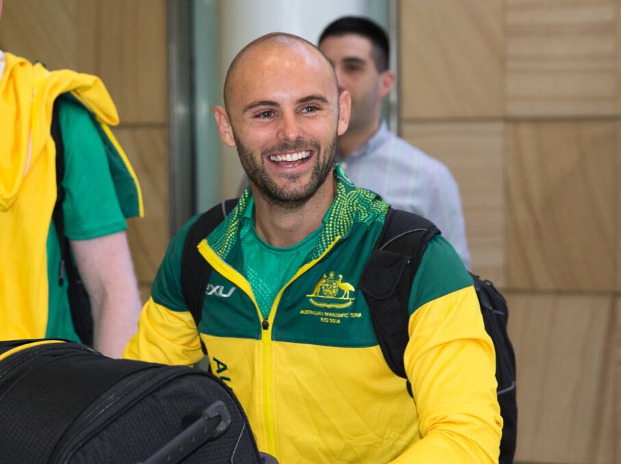 Scott Reardon touches down in Sydney after winning gold at the 2016 Paralympic Games in Brazil. Picture: Janie Barrett, The Canberra Times