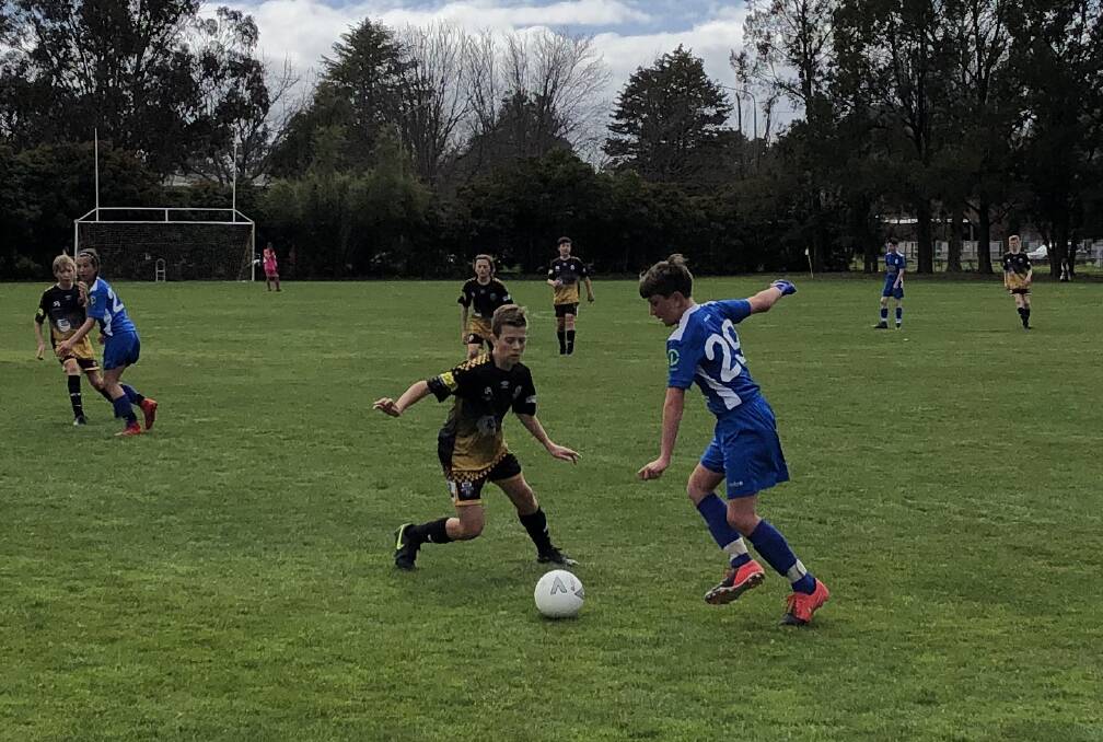 TOP GOALSCORER: Wagga City Wanderers under 13s striker Kade Lyons ready to bamboozle a Canberra Olympic opponent during their game earlier this month.