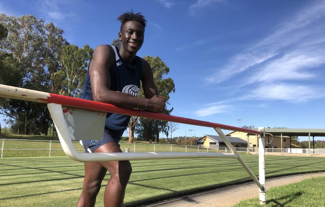 THE SMILE IS BACK: Godfrey Okerenyang at Jubilee Park this week, enjoying being back into the swing of his athletics. Picture: Peter Doherty