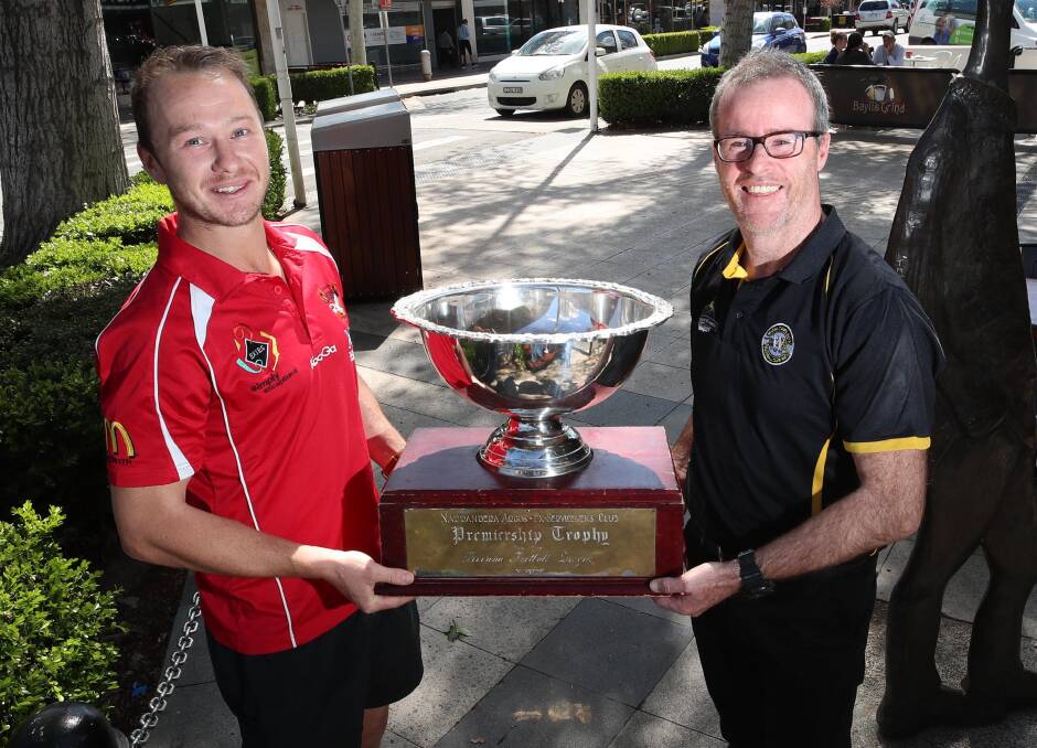 Griffith coach Will Griggs and Wagga Tigers' Troy Maiden with the spoils of victory. Picture: Les Smith