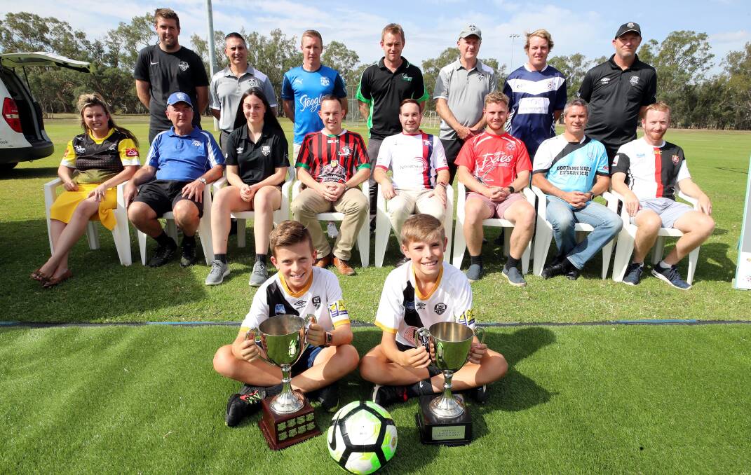 Representatives from Football Wagga and all of its clubs are with Wanderers young guns Kade Lyons and Finn Jenkins at the organisation's launch of their Rawlings Park redevelopment fundraising earlier this year. Picture: Les Smith