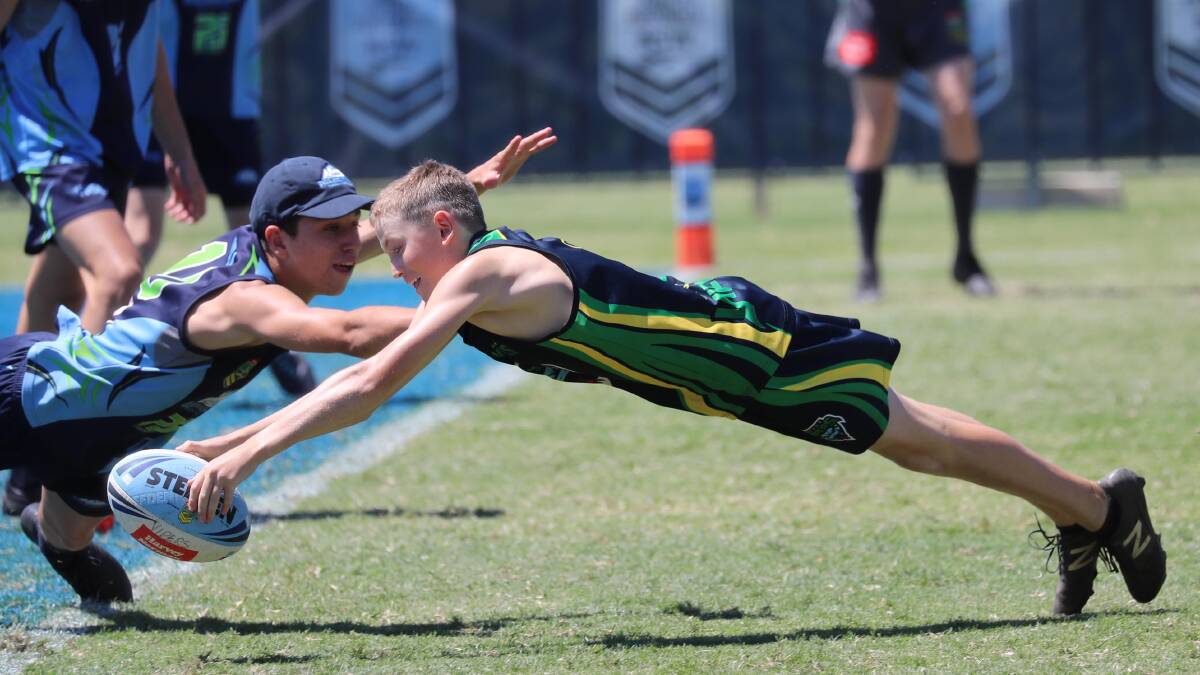 DESPERATE DIVE: Wagga Vipers' Charlie Wykes goes all out for a try in the under 16 boys win against Lower Blue Mountains. Picture: Les Smith