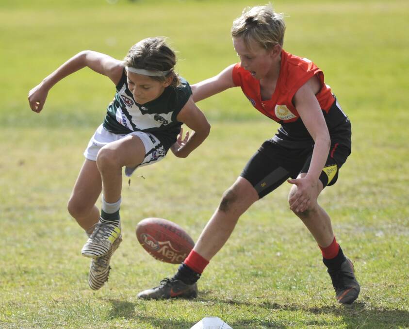 Coolamon and Wagga Swans do battle in a WDJFNL game last month. Picture: Chelsea Sutton