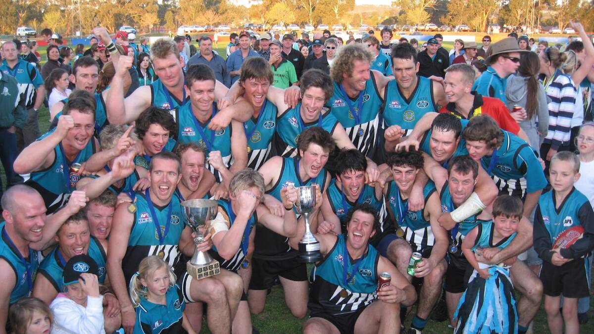REMARKABLE SCENES: The Jets community celebrates the 2007 premiership, with Ged O'Brien squeezed in there.