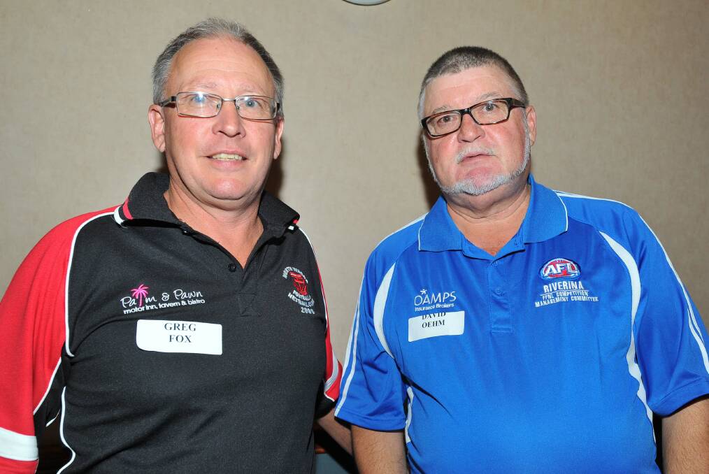 Former North Wagga president Greg Fox with Farrer League president David Oehm in 2014. Fox has joined the Farrer League CMC for next year and is a likely replacement for the president in 12 months.