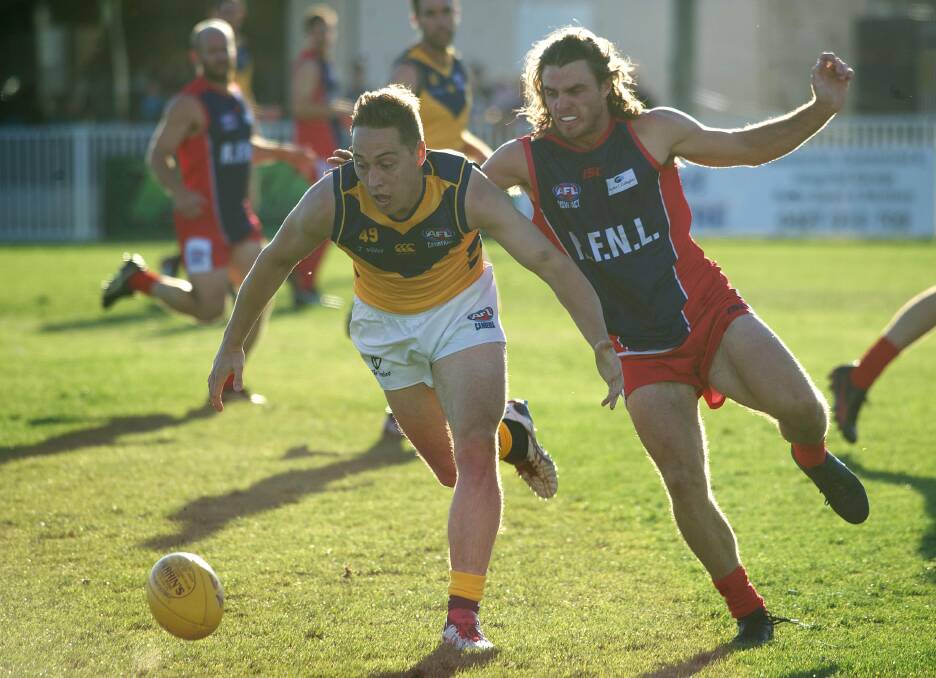Lovell playing for the Riverina rep team against the best of AFL Canberra a couple of years ago. 