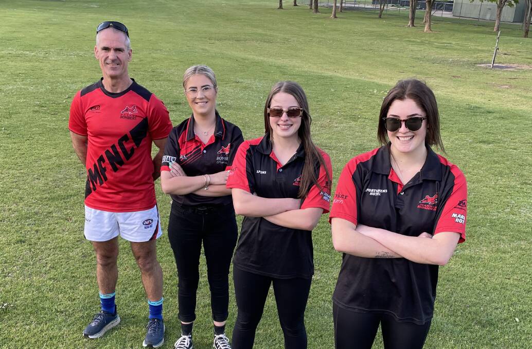 BOMBERS AWAY: Marrar coach Shane Lenon with women's footballers (from left) Hannah Lenon, Issy Cunningham and Caitlin Kelly. Picture: Peter Doherty