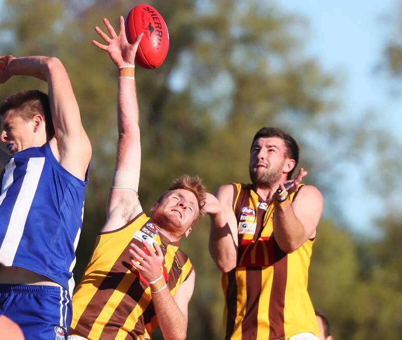 BIG CALL: Hull playing against Temora in the middle of last season with his left pinky finger taped up.
