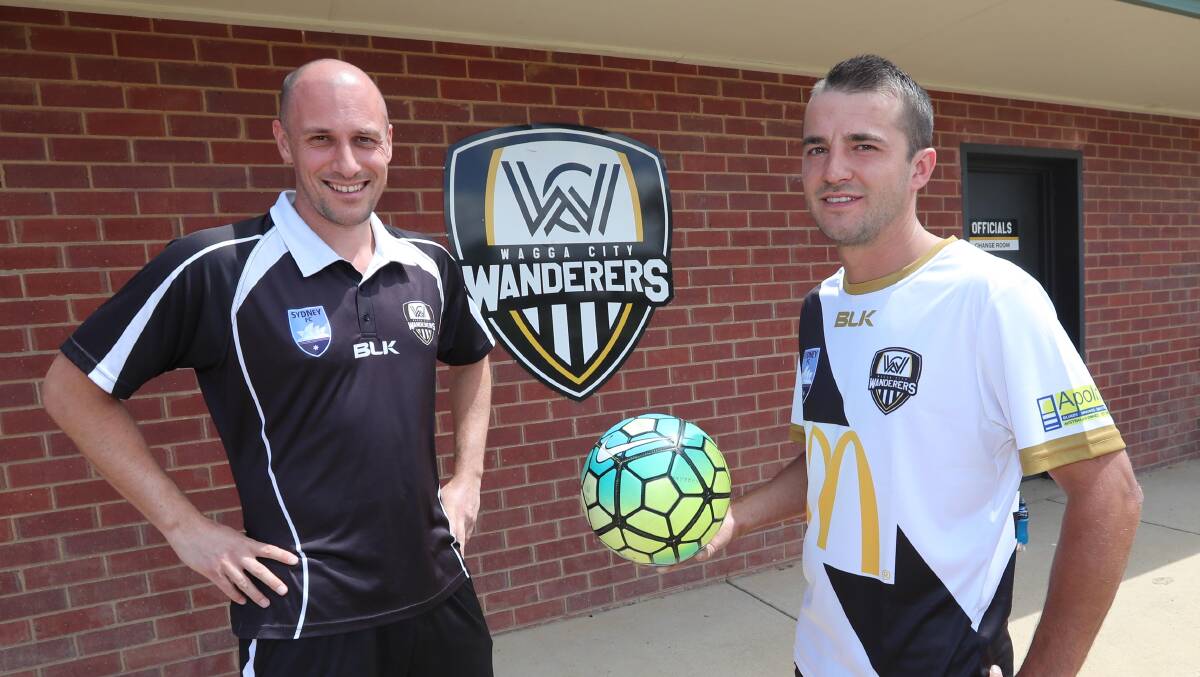 CHANGE OF HEART: Wanderers coach Ross Morgan with their major recruit, Joe Preece, who has since backed out of the move and returned to Riverina Rhinos. Picture: Les Smith