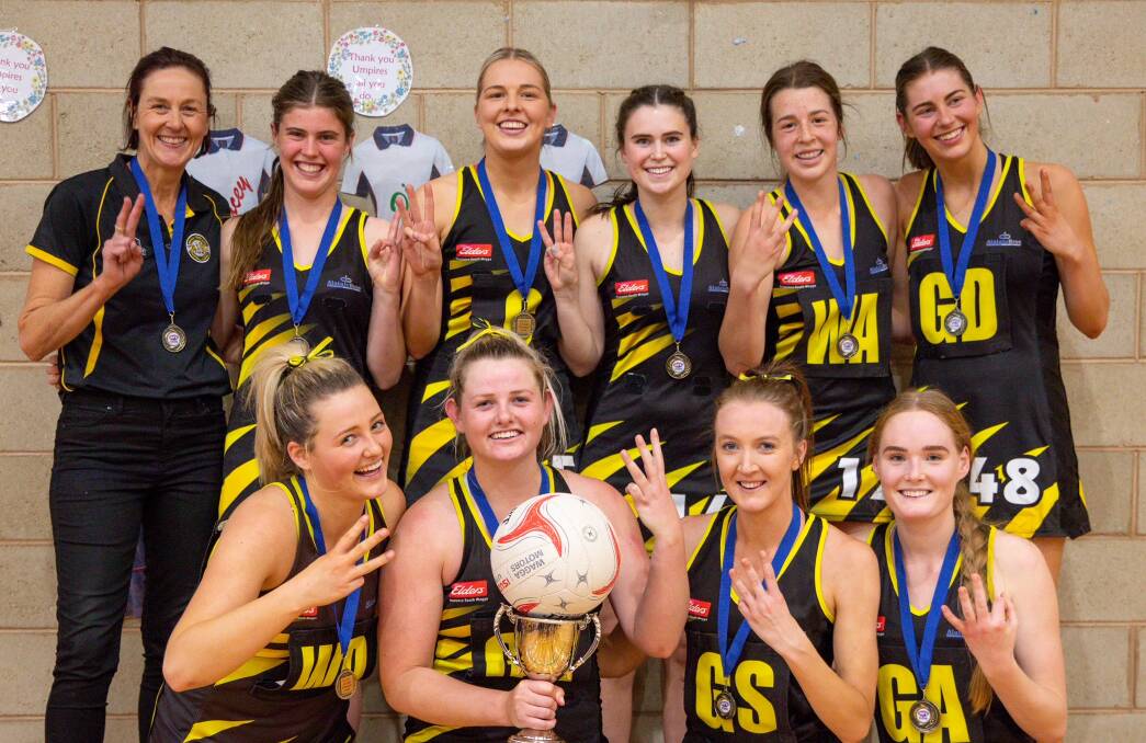 THREE IN A ROW: Wagga Tigers celebrate their stunning comeback victory against Collingullie-GP at Narrandera on Saturday. Picture: Andrew McLean