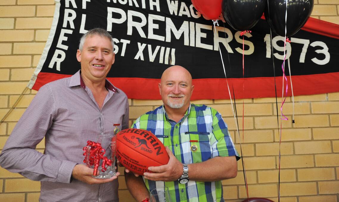 Peter Keating (left) and Rod Sheedy received life membership at North Wagga in 2014 for their efforts in helping resurrect the club. They're among those the Winters want to win for on Saturday. 