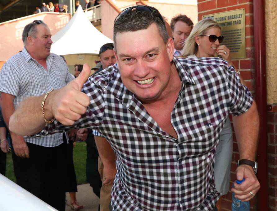 THUMBS UP: Trainer Joe Cleary after winning the Town Plate in 2018. Picture: Les Smith