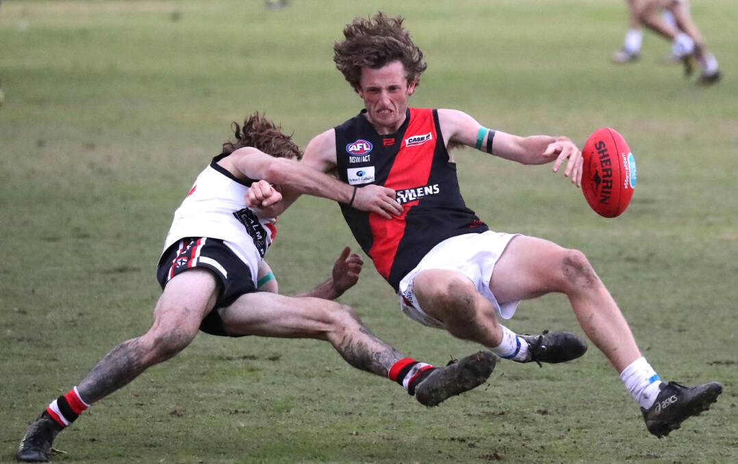CRASH: North Wagga's Corey Watt (left) and Marrar's Matt Hort collide during the second half at McPherson Oval on Saturday. Picture: Les Smith
