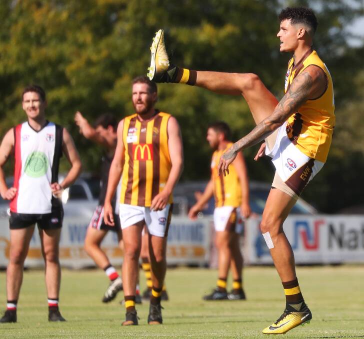 Turner watches on as Boumann boots a goal in their win at North Wagga. Their injuries hurt EWK in the last quarter last week when some opportunities up forward finally came for the Hawks. Picture: Emma Hillier