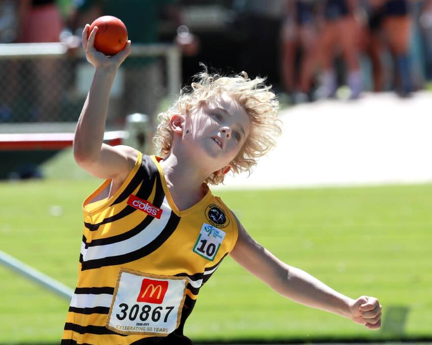 BIG EFFORT: Wagga's Ben Bull takes on the shot put in a state little athletics qualifying event last summer. Picture: Les Smith