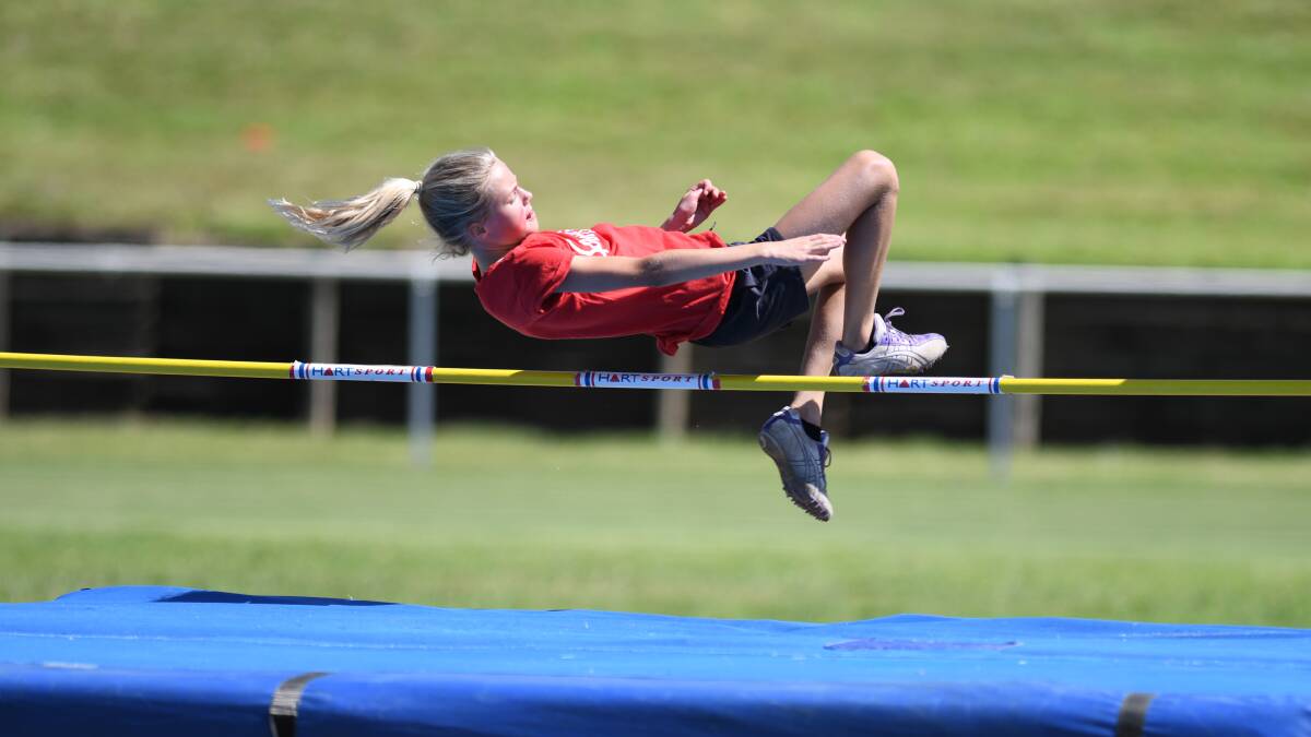 SAILING: Summer Beresford is about to clear the bar in the high jump, on her way to winning senior girls age champion at North Wagga Public School's athletics carnival. 