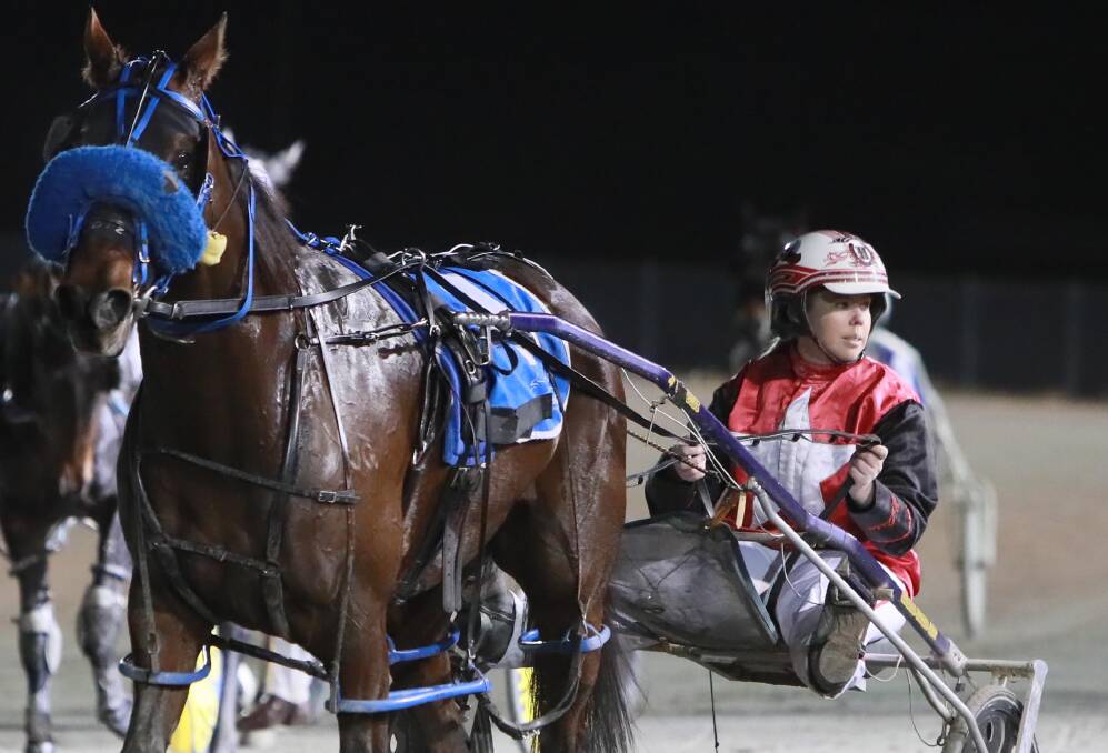 Canberra's Melissa Hawke (pictured at Wagga in May with Never Been Said). She'll be back at Riverina Paceway to steer Crime Dont Pay on Friday, which she owns with father Michael.