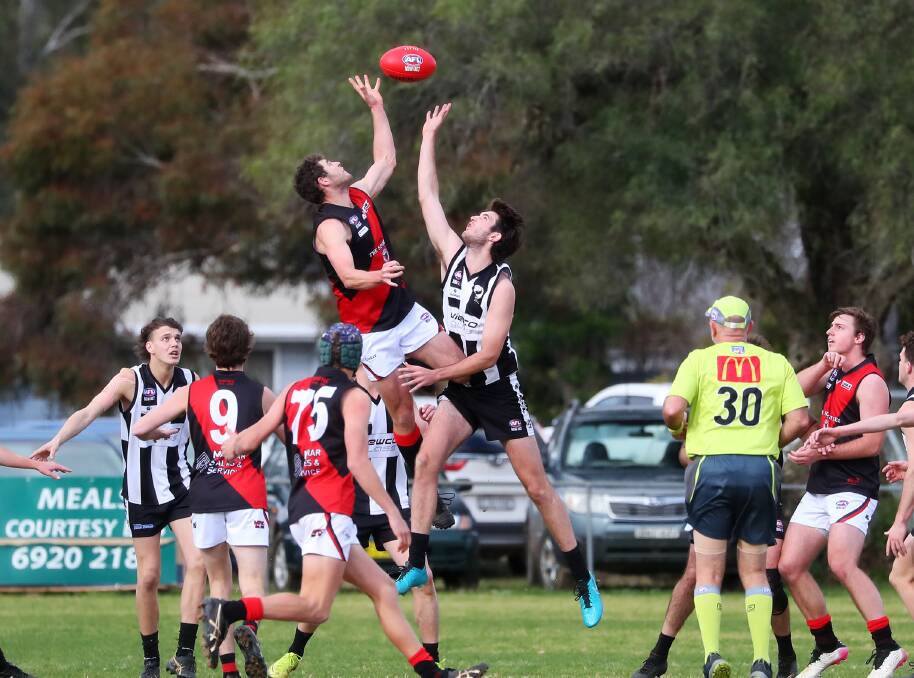 Jack Driscoll competes with Marrar's Nick Molkentin in his first game at The Rock this year.
