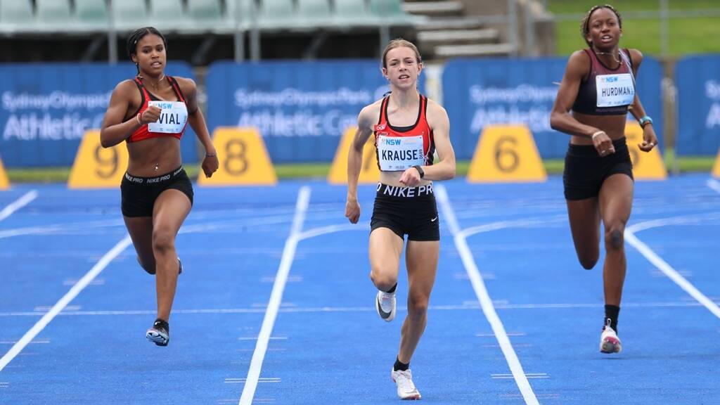 BEND DOMINANCE: Grace Krause powering to a stunning victory in Sydney at last week's NSW Junior Athletics Championships. Picture: Athletics NSW