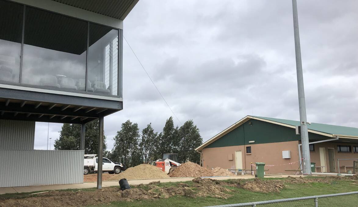 EXTRA CHANGEROOMS: Female changerooms and amenities block is being built between the grandstand and the current changerooms. For the NRL game, each club will have their own 'set' of changerooms. Picture: Peter Doherty