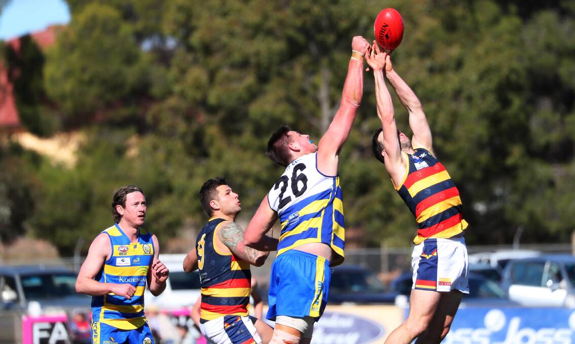 TWO WEEKS: MCUE big man Andrew Dickins (pictured in last year's finals) was unsuccessful in appealing a headbutting charge and will miss two games. 
