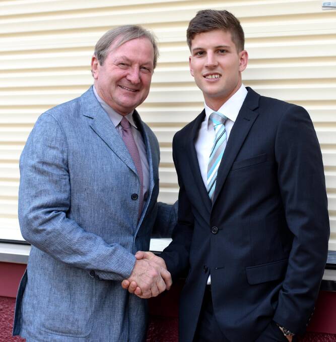 Luke Breust with Kevin Sheedy in Wagga in 2015 after being named in the Riverina AFL Team of the Century. 