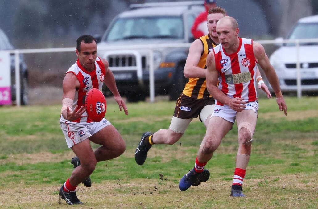 HIGH ENERGY: The Bushpigs are excited about the return of midfielder Rob Herzfeld for Saturday's crunch game against the Northern Jets, with co-captain Brayden Ambler (right) injured. Picture: Emma Hillier