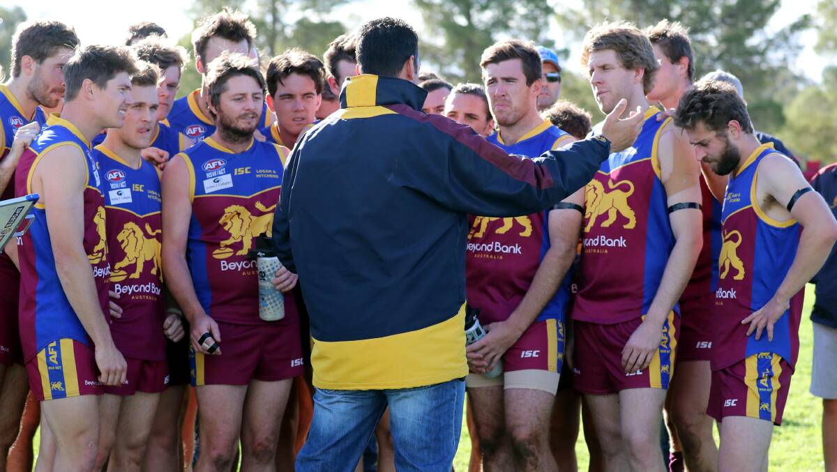 Coach Christin Macri addresses his Lions last year. Jason Hamblin says the experienced and respected coach is a big help at a club facing a difficult and ever-changing season. 