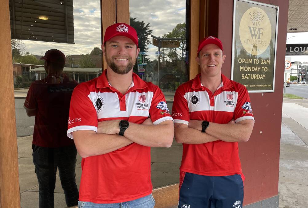 EXCITED: New Bushpigs forward and assistant coach Jeff Ladd with CSU coach Travis Cohalan this week at the club's major sponsor, the William Farrer Hotel. Picture: Peter Doherty