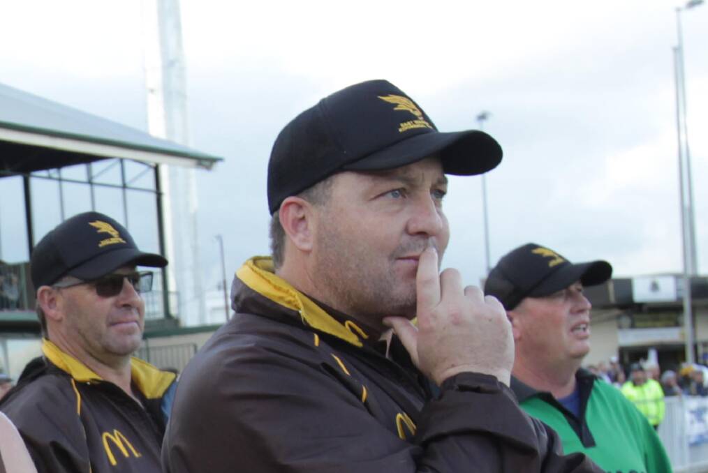 BIG MOMENT: EWK coach Gavin McMahon late in last year's grand final win against Coleambally. The Hawks have made three straight deciders under McMahon.