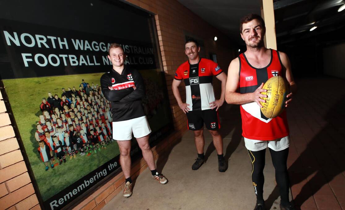 CLUB FIRST: North Wagga's long-term backmen Sam Longmore and Matt Thomas with coach Cayden Winter at McPherson Oval. Picture: Les Smith