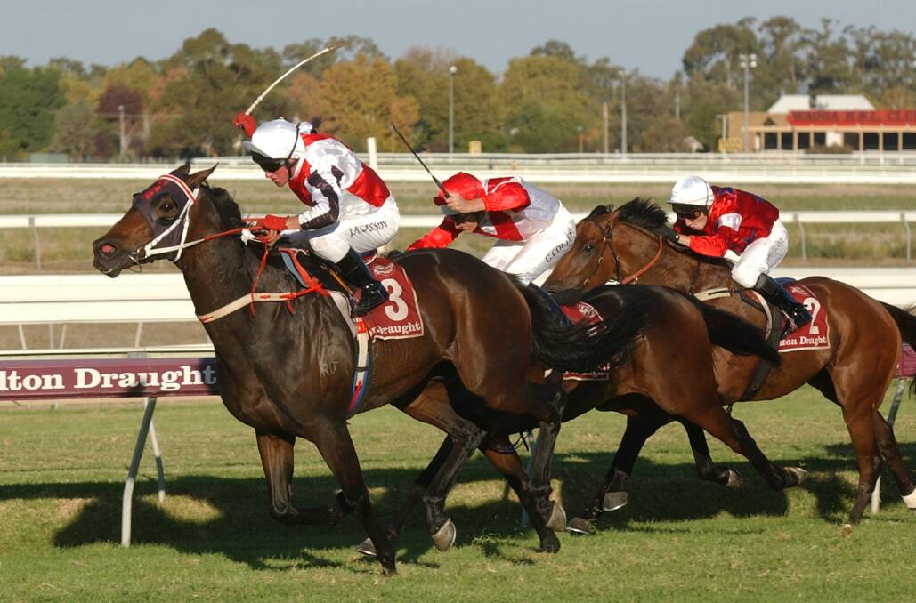 Cassidy hitting the front in the 2003 Wagga Gold Cup on Kreisler Mirage. Picture: Les Smith