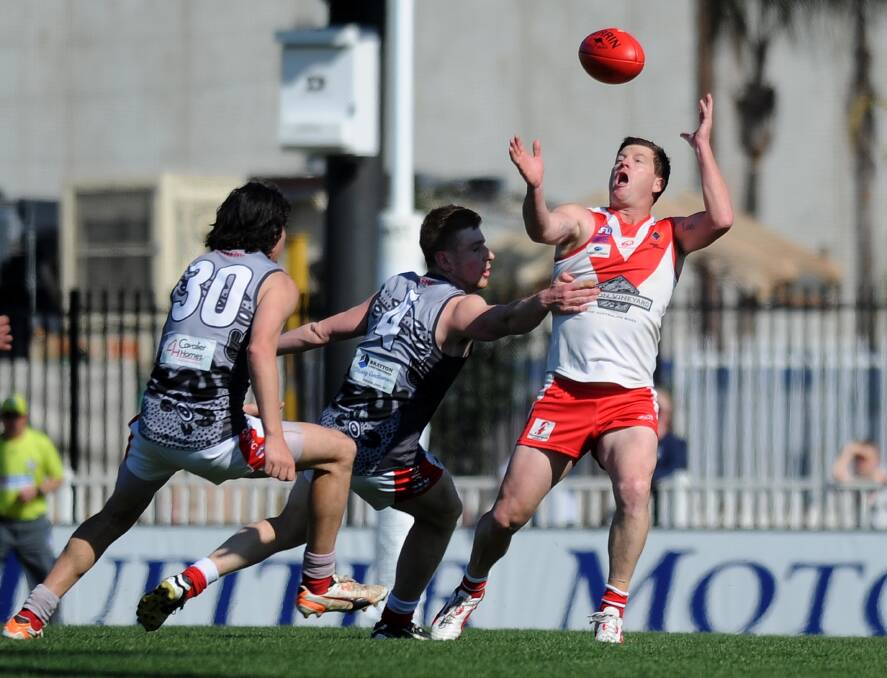 Mick Duncan in action against Collingullie-Glenfield Park in last year's preliminary final. Duncan and returns for Griffith in tomorrow's second semi-final against the Demons at Narrandera Sportsground