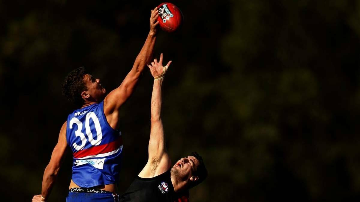 REPRESENTATIVE RUCKMAN: Temora recruit Anthony Atkin, left, in action for Black Diamond League club, Warners Bay. Picture: Newcastle Herald