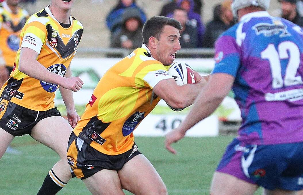 James Smart in last year's grand final loss to Southcity. The Tigers take a step on the journey towards going one better this year when they travel to Sydney for their only pre-season hit out. 