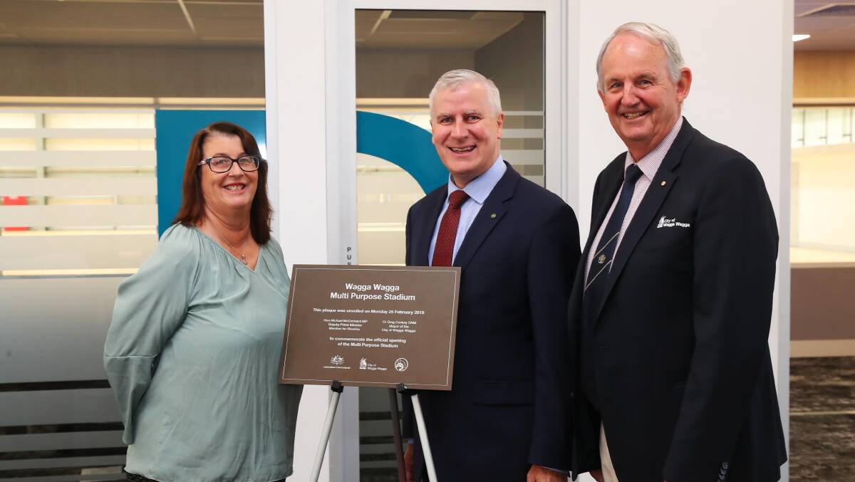 Wagga Netball president Rosemary Clarke at the opening of the new stadium, along with Member for Riverina Michael McCormack and Wagga Mayor Greg Conkey (right). Picture: Emma Hillier